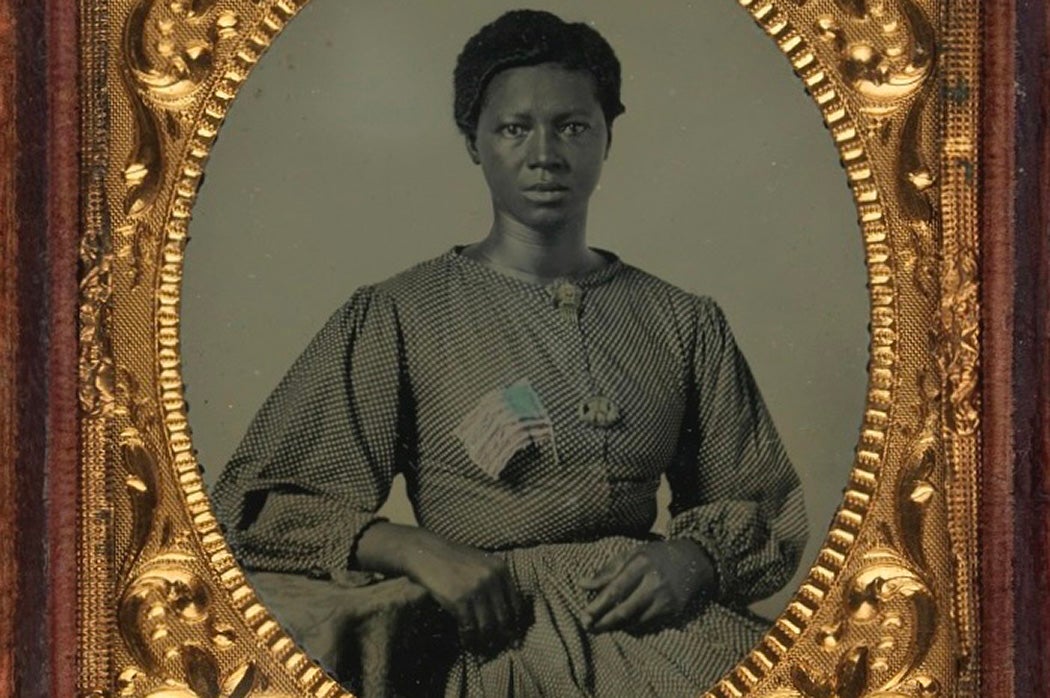 Ambrotype of African American Woman with Flag - believed to be a washerwoman for Union troops quartered outside Richmond, Virginia