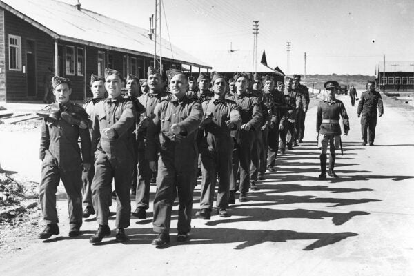 Arabs and Jews marching side by side as a Palestinian army for service with the British army as an Auxiliary Military Pioneer Corps.