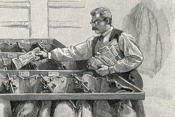 Postal worker sorting letters and newspapers 1901