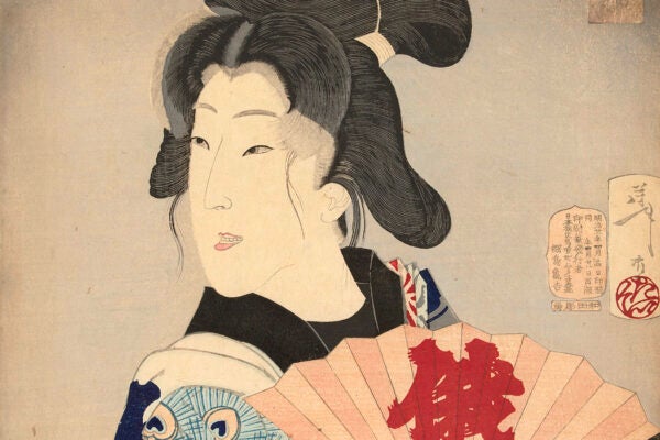 A Geisha with an open fan