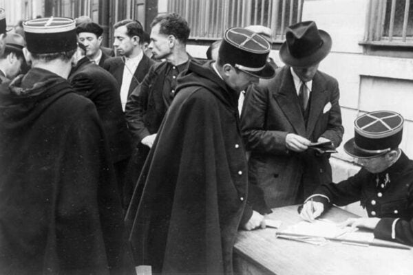 The French police arrest the Jews on the orders of the German occupiers and take their personal details, Paris, 1941