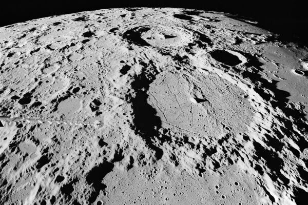 Ptolemaeus crater (foreground), Alphonsus crater, and Arzachel crater, looking south.