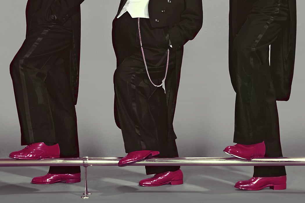 Three men wearing tuxedos and bright red patent leather shoes, ca.1950s. 