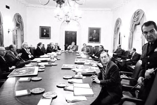 Air Force Chief of Staff General David C. Jones briefs the National Security Council on possible military options during the second meeting on the Mayaguez crisis, 1975