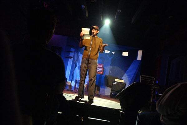 Poet Johnathan McClain reads his poetry at the Bowery Poetry Club December 6, 2002 in New York City.
