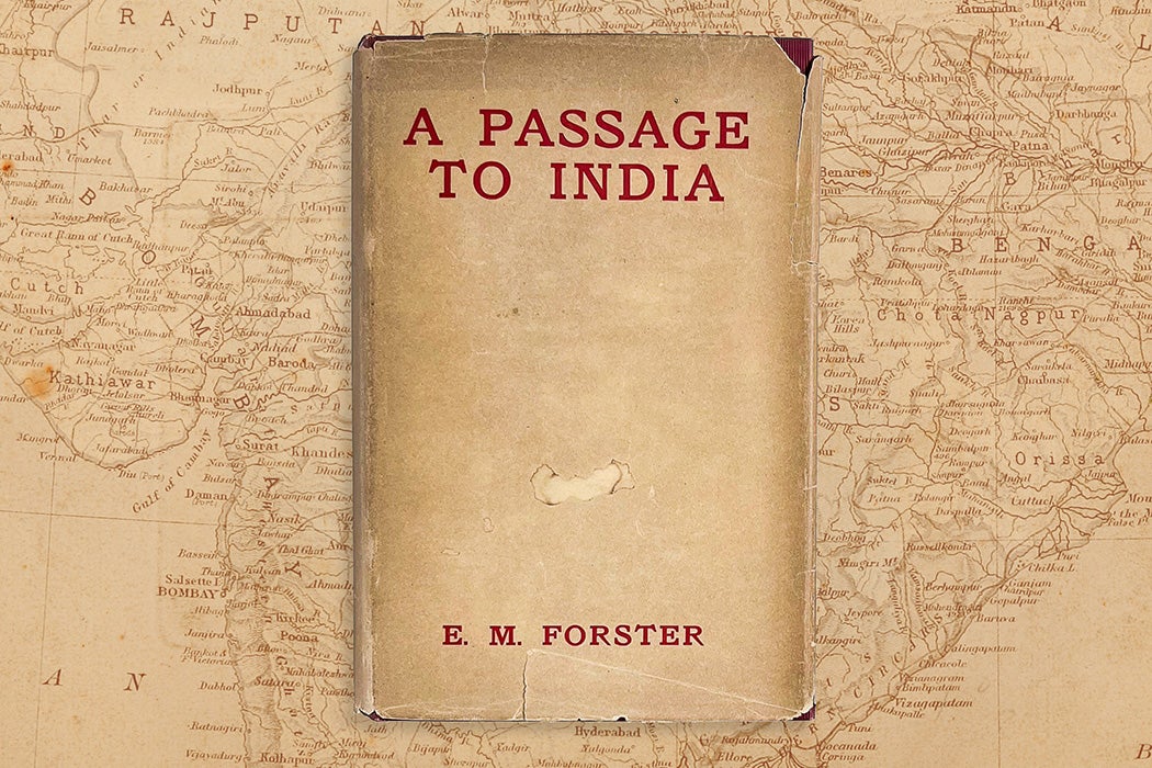 The cover of A Passage to India on top of a 1920s map of India