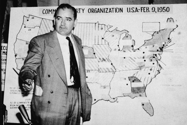 American politician Joseph McCarthy (1908 ? 1957), Republican senator from Wisconsin, testifies against the US Army during the Army-McCarthy hearings, Washington, DC, June 9, 1954. McCarthy stands before a map which charts Communist activity in the United States.