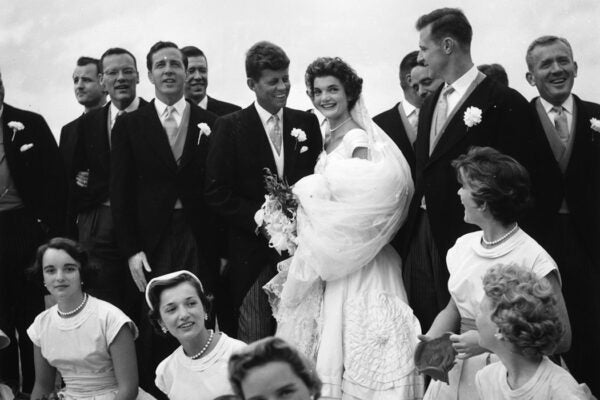 12th September 1953: John Kennedy (1917 -1963) and Jacqueline Bouvier (1929 - 1994) pose with their ushers and maids of honor on their wedding day,