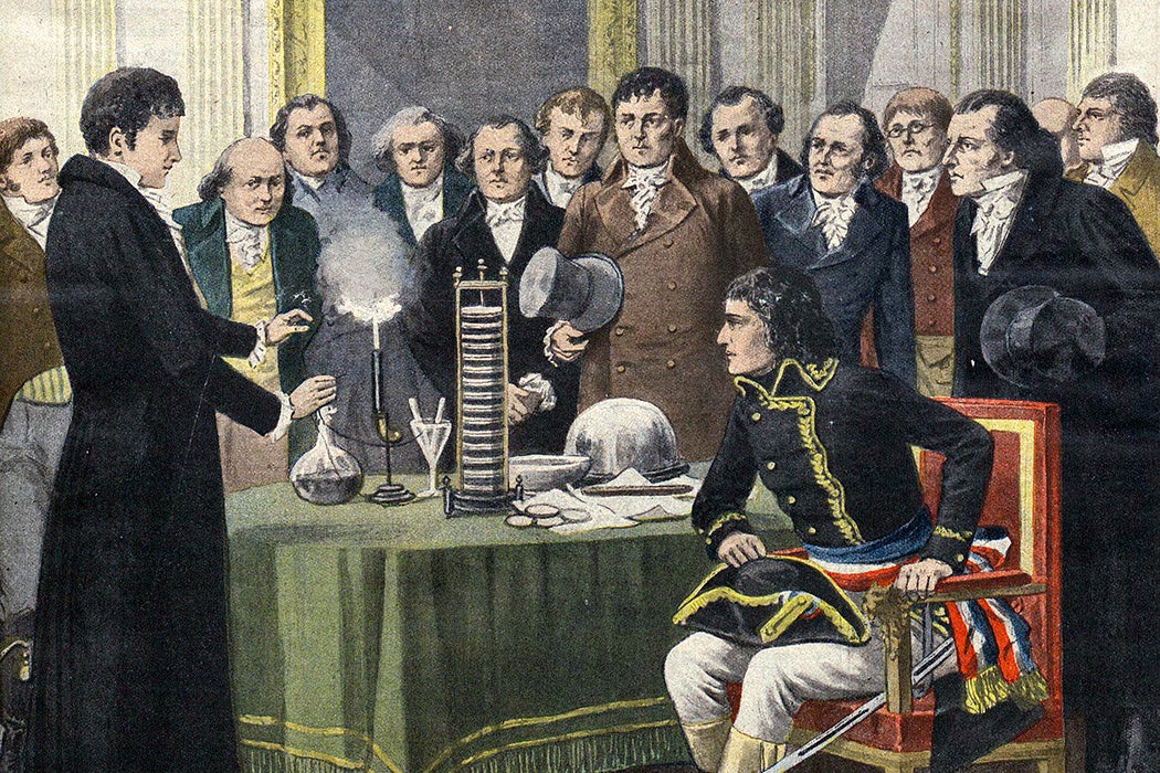 Italian physicist Alessandro Volta (1745-1827), demonstrating his pile (battery) to Napoleon in Paris, 1801.