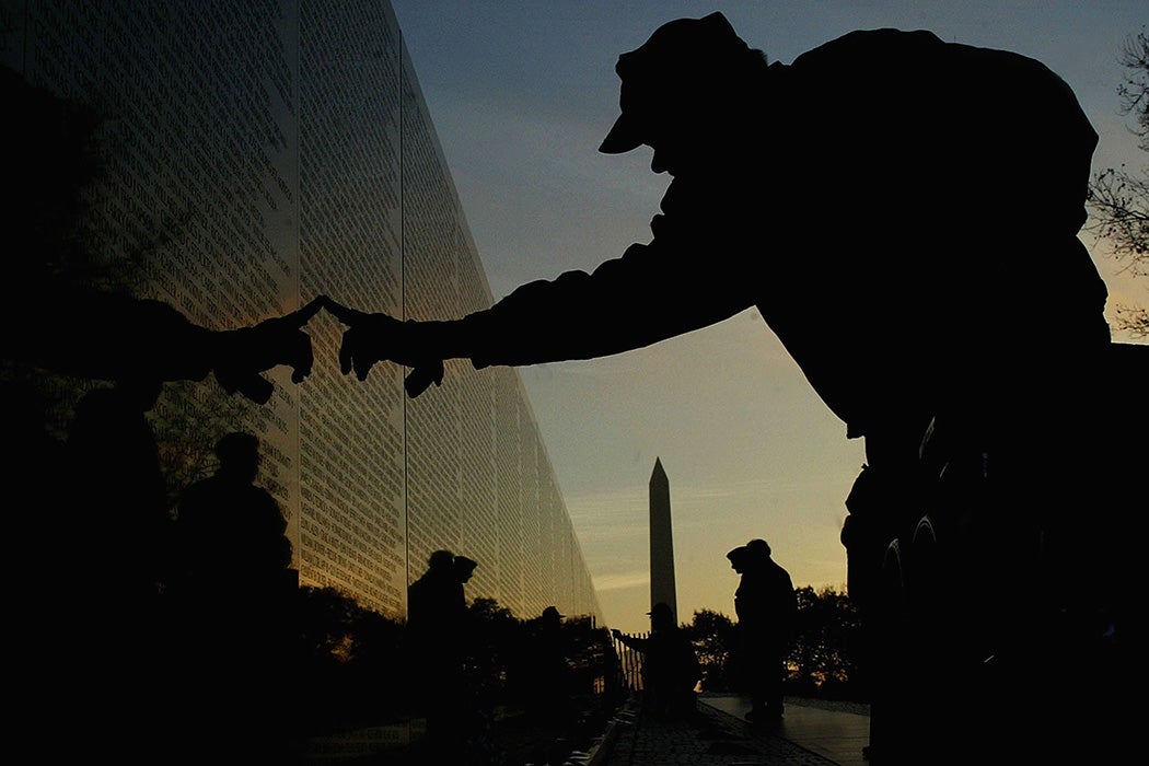 Ken Bundy from Bridgeport Ct. who served in Vietnam for 2 years touchs the Vietnam Memorial, November 11, 2003 in Washington, DC.
