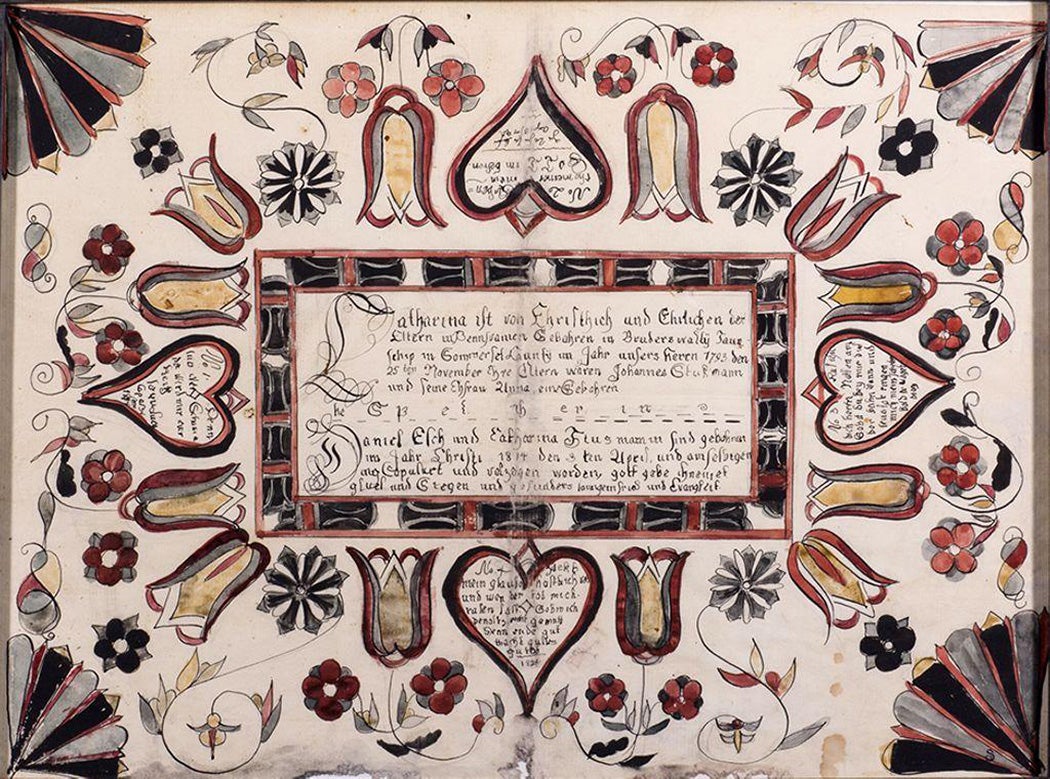 Elaborate hand painted Pennsylvania Dutch fractur marriage document between Daniel Elch and Eatharina Stus depicting flowers and designs dated November 25, 1793 with hand inked lettering.