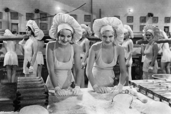 Members of the Goldwyn Cover Girls in bakery in a scene from the film 'Palmy Days', 1931.