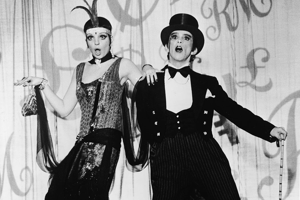 American actors and singers Liza Minnelli and Joel Grey perform on stage as nightclub performers in Germany during the Weimar Republic in the film version of the Broadway musical 'Cabaret' directed by Bob Fosse, 1972.