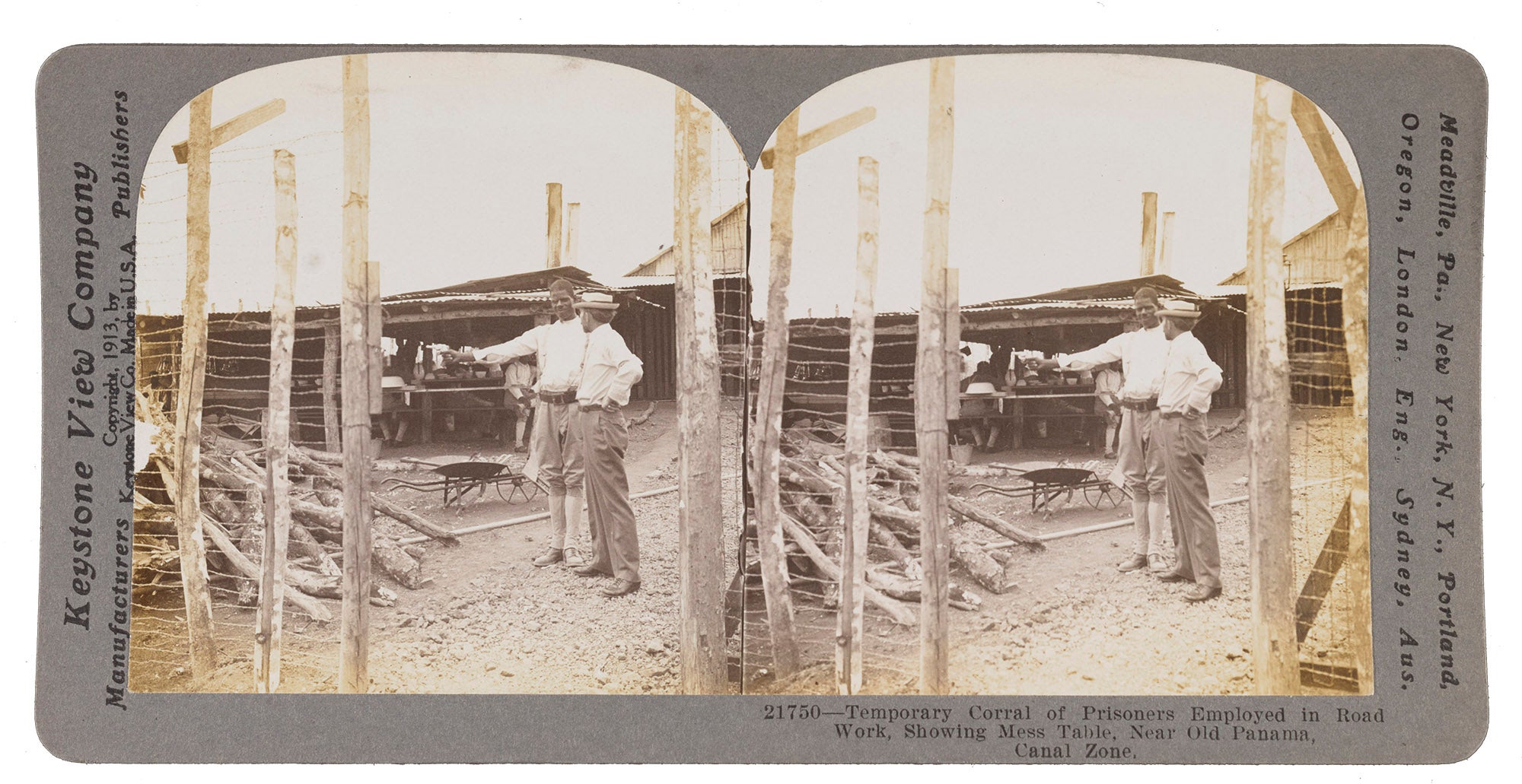Temporary corral of the prisoners employed in road work, showing mess table, near old Panama Canal zone