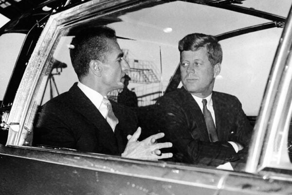 Shah Mohammed Reza Pahlavi of Iran sits and talks with American president John F. Kennedy, 1963