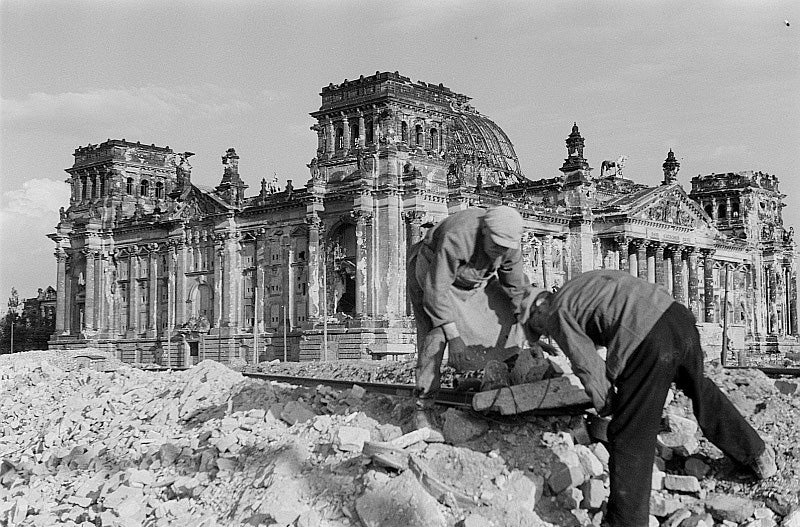People clearing debris in front of the Reichstag building, 1947