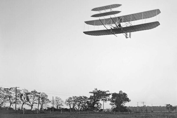 Left front view of flight 46, Orville turning to the left, in the last photographed flight of 1905; Huffman Prairie, Dayton, Ohio
