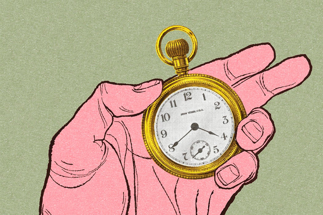 Hand Holding a Pocket Watch