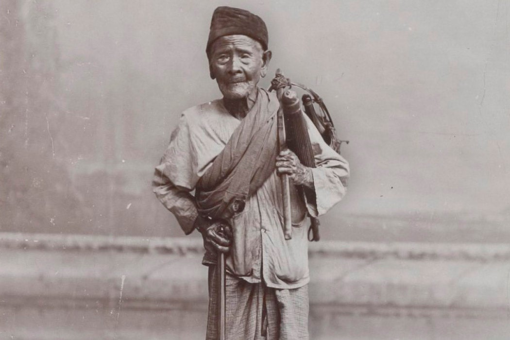 A traditional Malay healer, ca. 1890