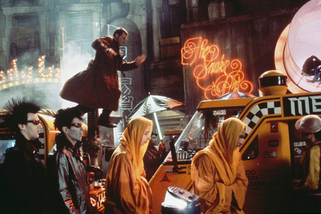 Rick Deckard (Harrison Ford) pursues the replicant Zhora through the streets of Los Angeles in a scene from Ridley Scott's futuristic thriller 'Blade Runner', 1982.