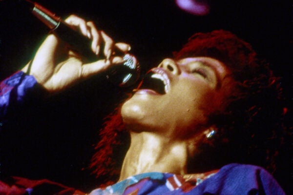 Whitney Houston performs onstage in July 1986