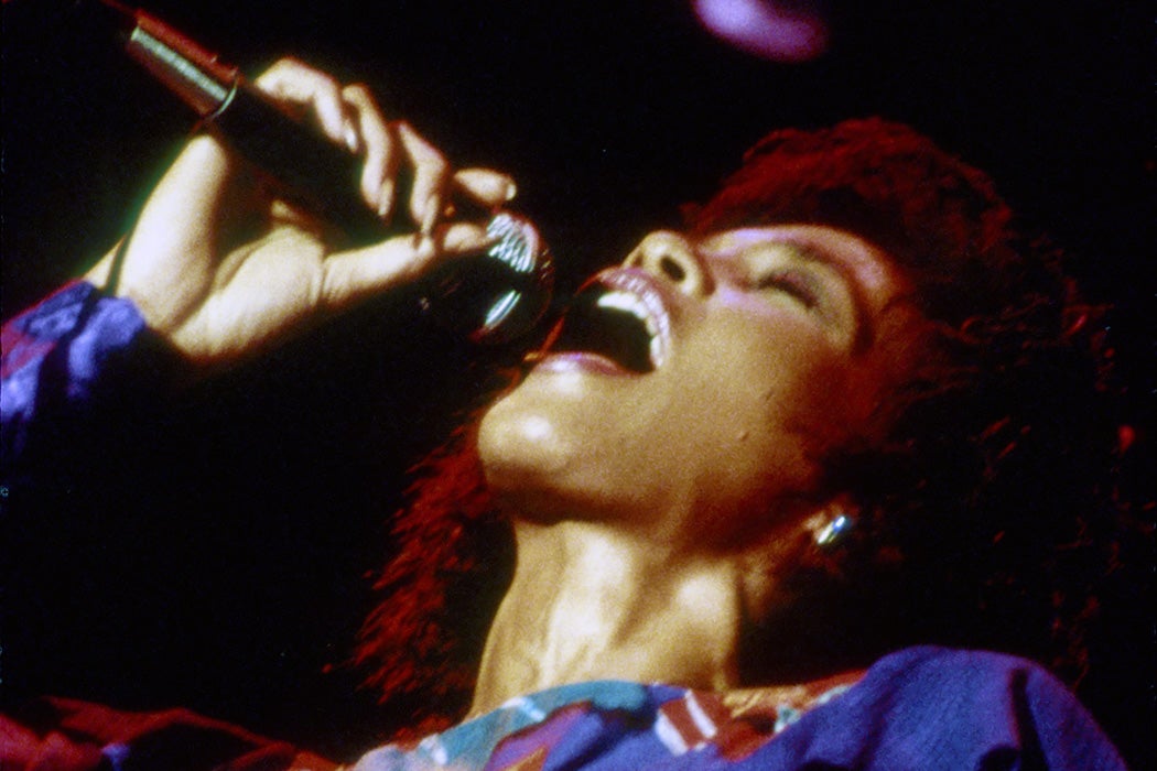Whitney Houston performs onstage in July 1986