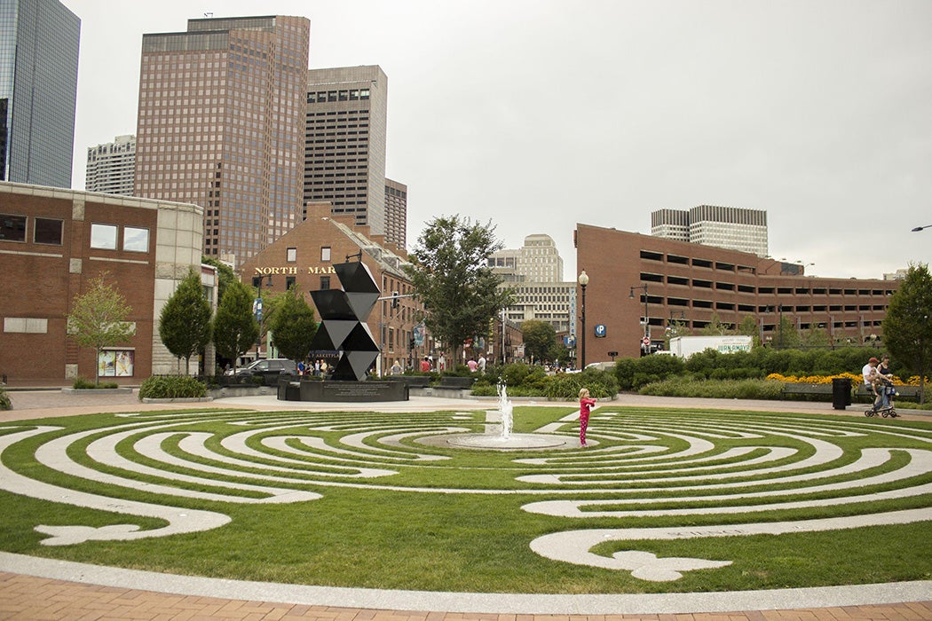 Wharf District Parks: Armenian Heritage Park The Labyrinth can be seen in the foreground and the sculpture can be seen in the background. Quincy Market is in the far background.