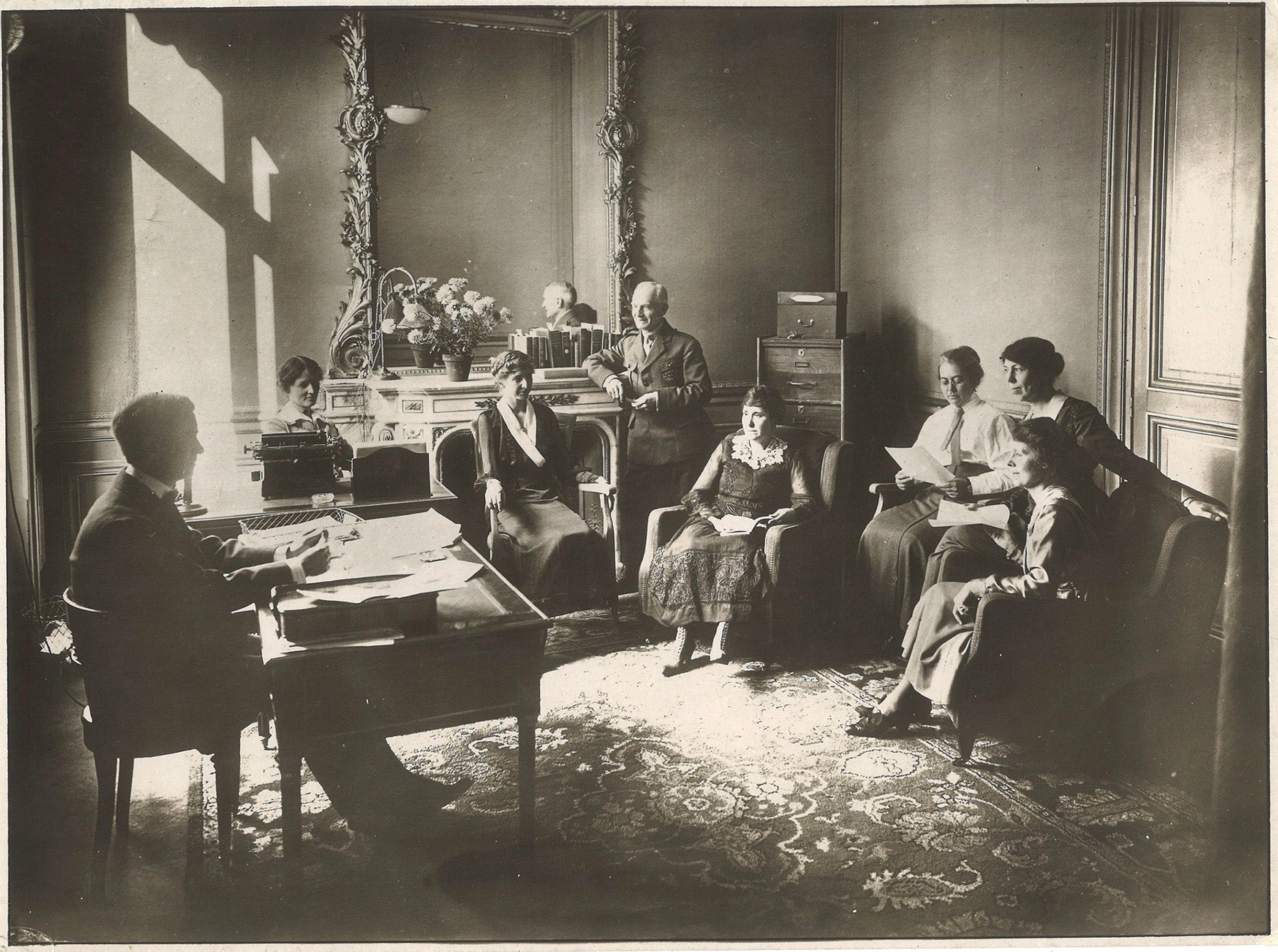 Library War Service staff in Director Burton Stevenson’s office (Stevenson seated at desk to left).