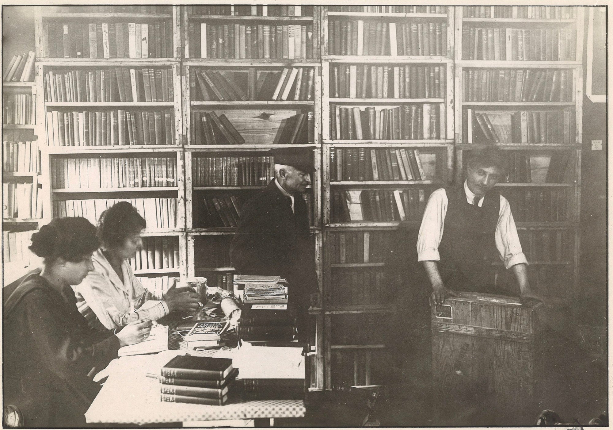 “ALA Central Library” Shipping Department. Personnel processing library materials.