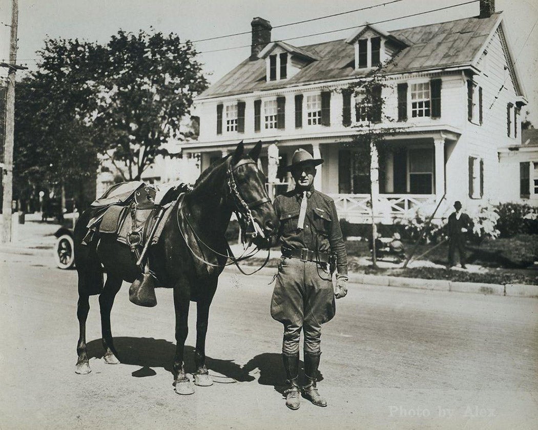 World War I soldier with horse at corner of Franklin Street and Fulton Avenue
