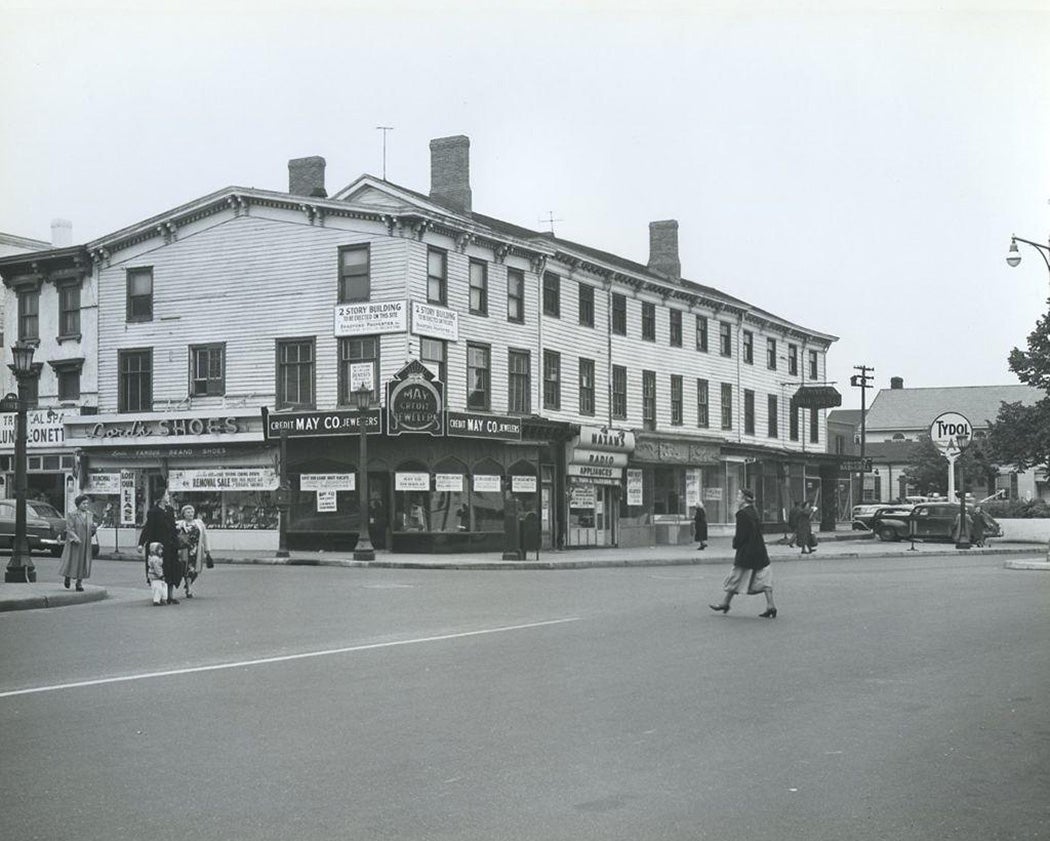 Commercial block at street intersection, Hempstead, New York