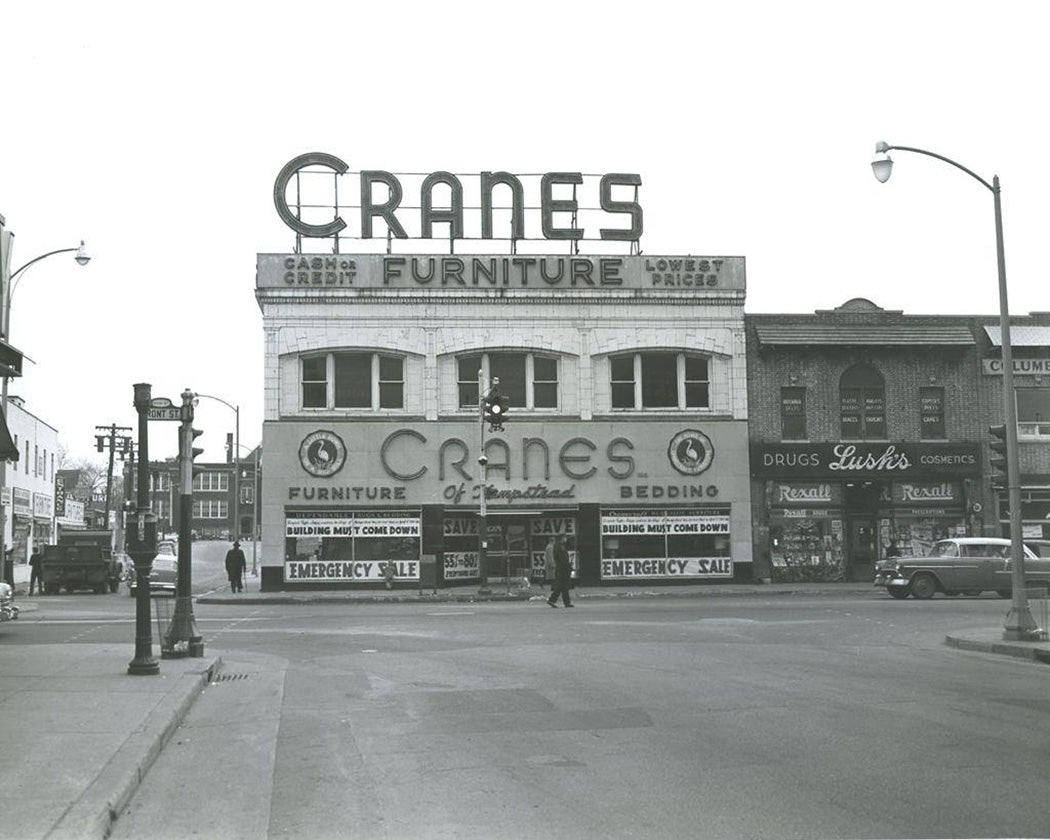 Cranes Furniture storefront at street intersection, Hempstead, New York