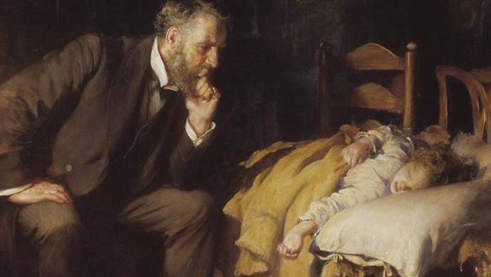 Detail of Sir Luke Fildes’ The Doctor showing a bearded physician leaning forward with one hand at his chin beside a child lying in bed.