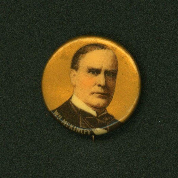 "Wm. McKinley" portrait button with gold background.