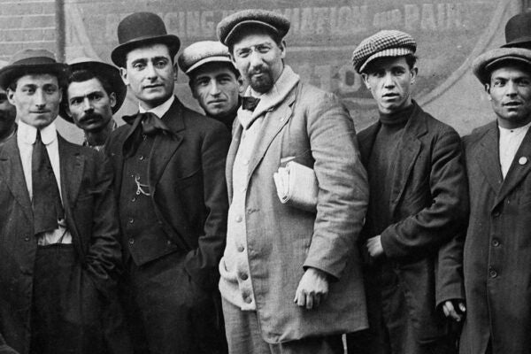 Italian-American labor organizer and activist Carlo Tresca with workers in Lawrence, Massachusetts, US, circa 1920.